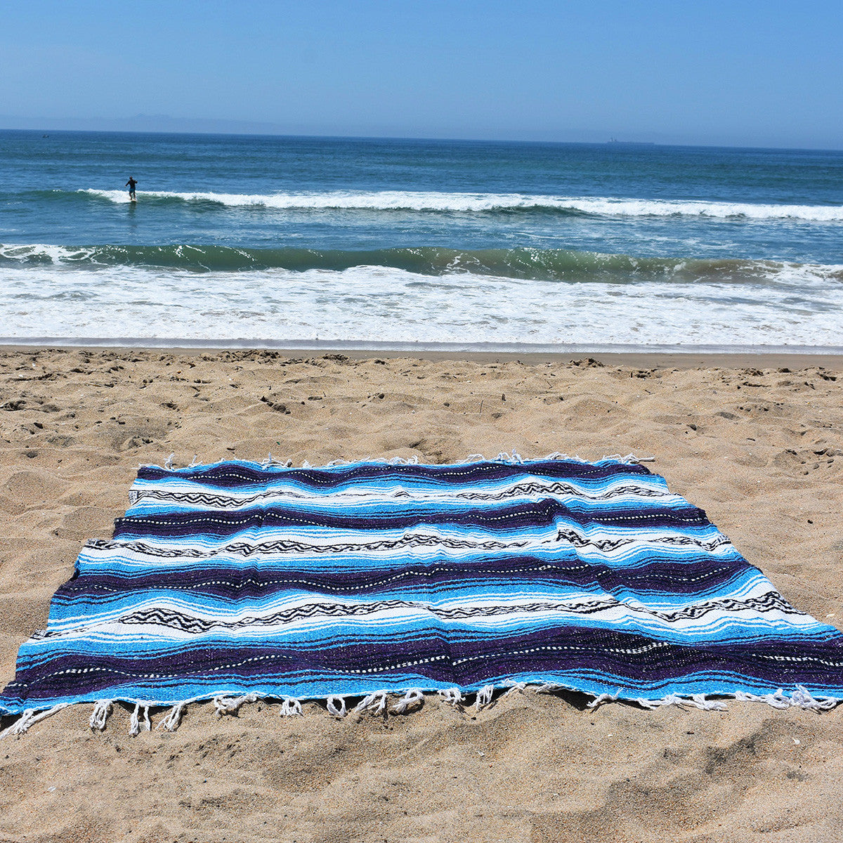 Turquoise Dream Mexican Blanket is perfect for a day at the beach.